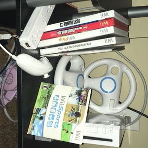Wii with wii games controls (wheels) and nunchucks
